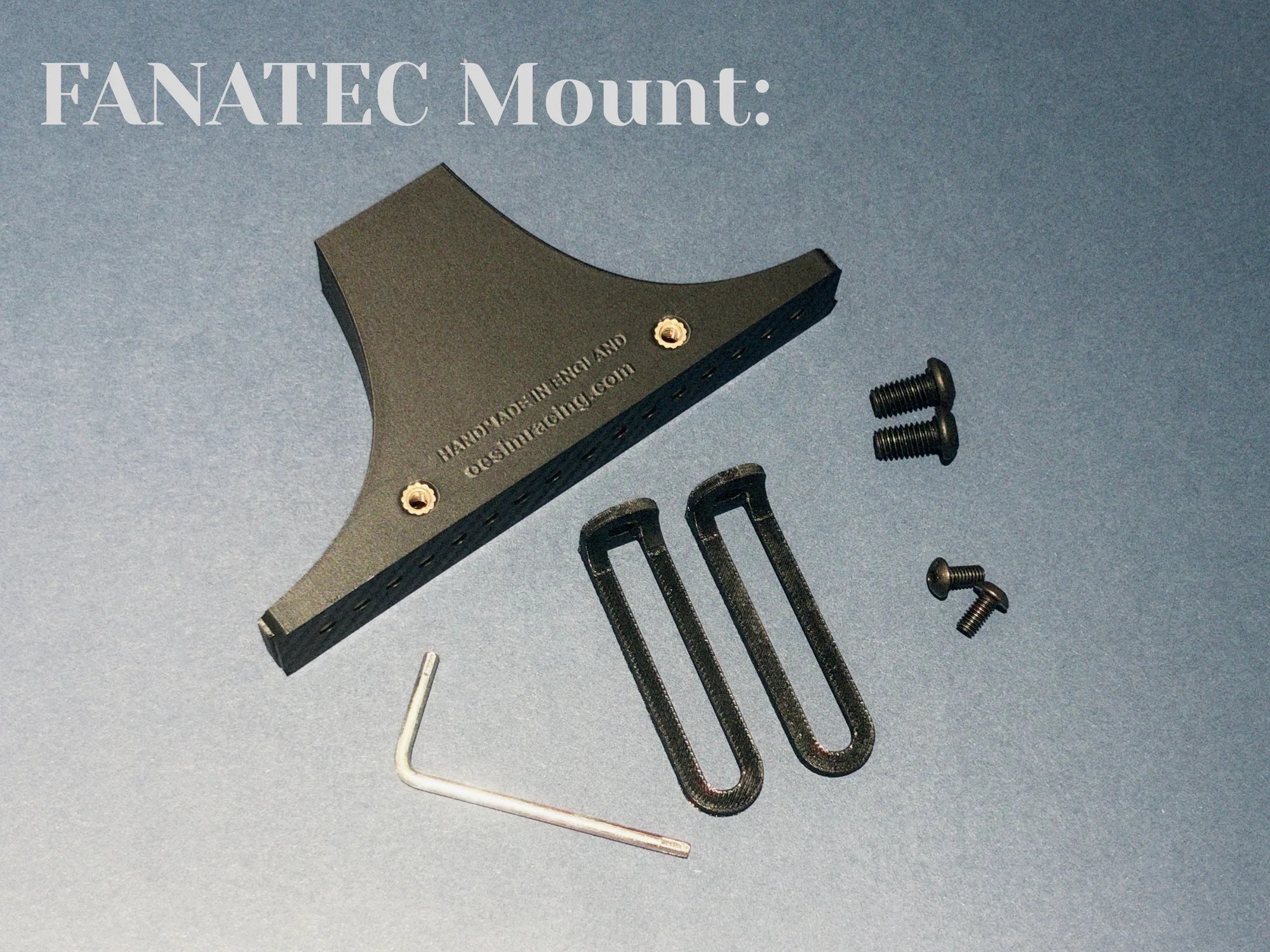 The Fanatec mount and everything that comes with it: the mount, its bolts, two U-brackets and the hex key